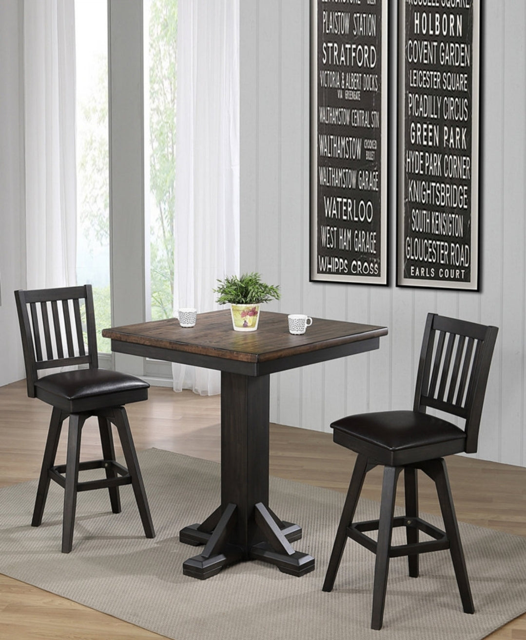 Peighton collection 42" high pub table paired with three swivel stools