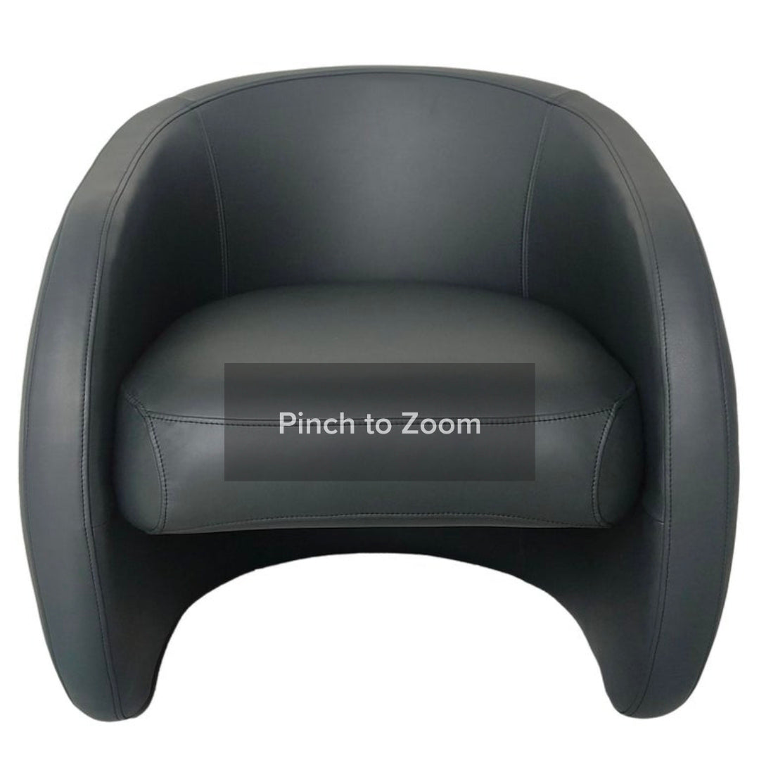 Berry armchair upholstered in Black leather by Bow and Arrow